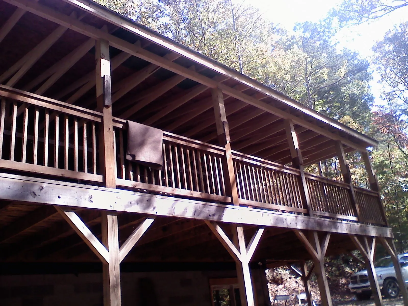 Timber framing under a new elevated porch and deck — Roof Leak Repair in Cato by Roofing Brothers